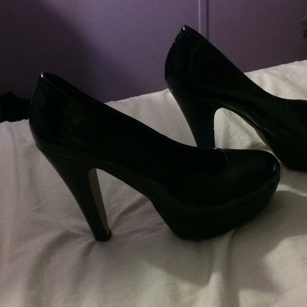 A pair of black high heels